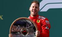 Australian GP: Opportunistic Vettel steals victory from Hamilton