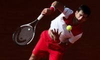 Tennis round-up: Djokovic powers past Nishikori; Wozniacki advances