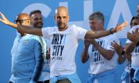 Man City coach Guardiola extends contract to 2021