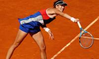 From red carpet to red dirt, Muguruza the warrior