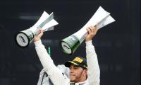 PIX: Hamilton wins Brazil GP and 5th F1 title despite engine trouble