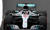 Hamilton storms to 80th pole in Japan, Vettel ninth