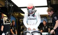 Hamilton fastest overall on damp day in Hungary