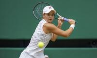 Classy Barty eases into week two at Wimbledon