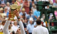 Djokovic outlasts Federer to win fifth Wimbledon title