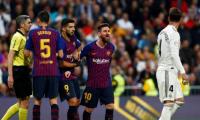 Barca hailed as champions-elect after beating Madrid