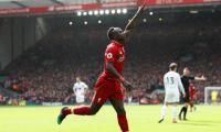 EPL PIX: Firmino, Mane keep Liverpool in the race; Arsenal beat United