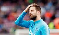 Barca's star defender Pique to hang boots