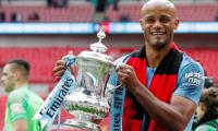 Kompany to leave Man City on a high after treble