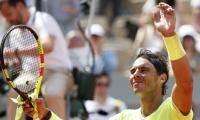 French Open PIX: Nadal, Djokovic advance; Wozniacki out