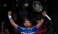 Djokovic thrashes Berrettini in ATP Finals opener