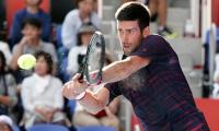 Roundup: Novak blasts past Pouille; Thiem tames Murray