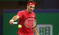 Djokovic, Federer progress to Shanghai quarters