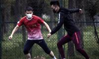 China's footballers join clubs after 14-day quarantine