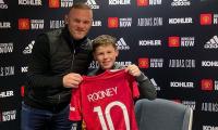 Wayne Rooney's son Kai signs for Manchester United