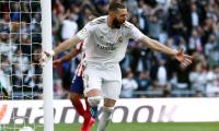 Benzema strike gives Real win; Bayern win to go top