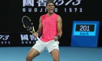 Nadal rides out Kyrgios challenge to reach quarters