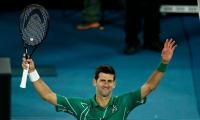 Djokovic sets up Federer showdown; Barty, Kenin cruise