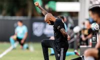 Henry kneels for 8 minutes, 46 seconds at MLS game