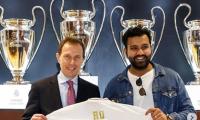 Real Madrid present Rohit with customised jersey