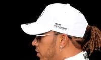 Hamilton plays down talk of Ferrari move 