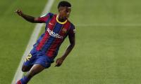 Barcelona's Fati out for four months after surgery