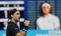 Thiem edges Tsitsipas in ATP Finals opener