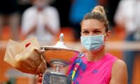 Halep claims Rome title after Pliskova retires 