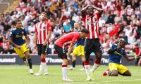 EPL PHOTOS: Saints bring United down to earth in draw