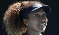 Calmer Osaka looking to be role model on court