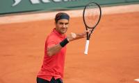 Federer happy to find higher gear against Cilic