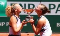 Krejcikova completes titles sweep in Paris