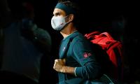 Federer returns after 14 months, no ice bath for champ