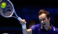 Tennis: Medvedev fights back to sink Hurkacz