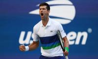 US Open Pix: Djokovic cruises; Rogers stuns Barty