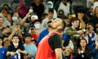 Showman Kyrgios goes from sick-bed to second round