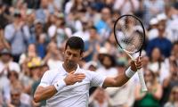 Wimbledon PHOTOS:  Djokovic, Jabeur advance