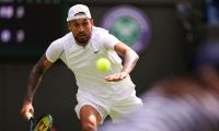 Painful knee hampers Kyrgios bid for Wimbledon glory