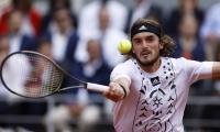 Tsitsipas hits back at critics after grasscourt title