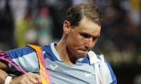 Nadal knocked out; Swiatek wins 25th straight match