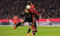 PIX: Bayern held to third straight draw; Barcelona win