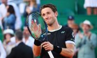 Ruud upsets Djokovic to join Tsitsipas in final