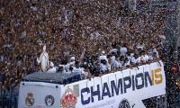 Fans chant 'Toni, stay' as Real parade UCL trophy