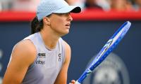 Wimbledon champ knocked out by 22-year-old Dane