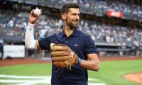 PIX: Djokovic Swaps Racket for Baseball at Yankees Game