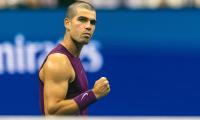 PIX: Alcaraz charges into US Open second round