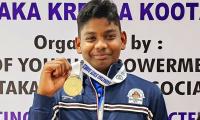 Jonathan, 15, stuns Olympic medallist to win gold