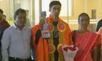 Champion Praggnanandhaa returns to rousing reception