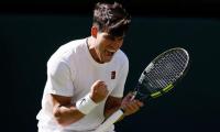 Wimbledon PIX: Alcaraz, Sabalenka survive heat, opponents