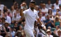 Wimbledon: Vintage Djokovic decimates local hope Evans